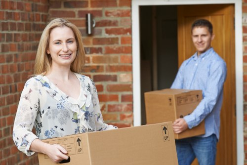 Careful wrapping and loading of household furniture in Kensington