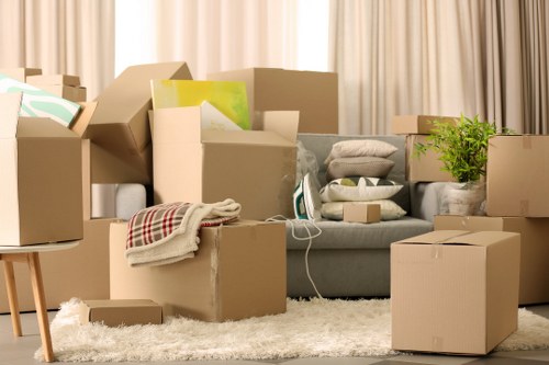 Removal team loading furniture for an urgent Kensington move