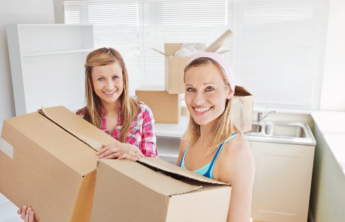 Movers Kensington handling a mid-move loading process with care