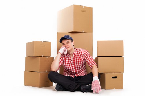 Trained movers using PPE during a Kensington relocation